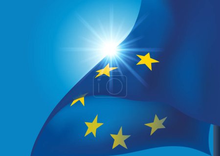 Flag of the European Union fluttering against the light on a background of blue sky.