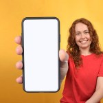  woman showing smartphone with blank white screen