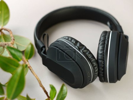 Photo for Soft focus photo of wireless headphones, high technology - Royalty Free Image