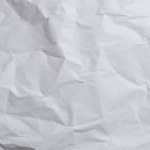 white crumpled sheet of paper, background