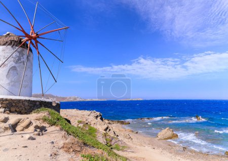 Photo for View of Mycons island with a typical windmill in Greece. - Royalty Free Image