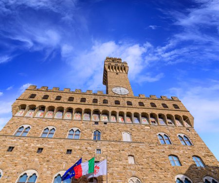 Photo for Urban view of the historic center in Florence, Italy: the Palazzo Vecchio with Arnolfo's Tower from the Piazza della Signoria. - Royalty Free Image