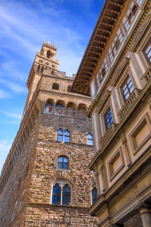 Photo for Urban view of the historic center in Florence, Italy: the Palazzo Vecchio with Arnolfo's Tower from courtyard of the Uffizi Gallery - Royalty Free Image