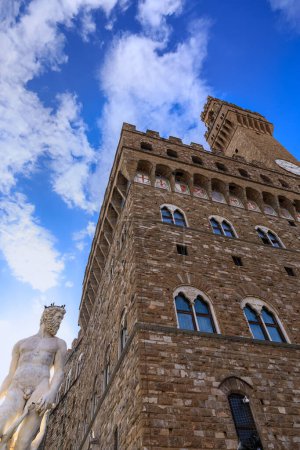 Photo for Urban view of the historic center in Florence, Italy: the Palazzo Vecchio with Arnolfo's Tower from the Piazza della Signoria. - Royalty Free Image