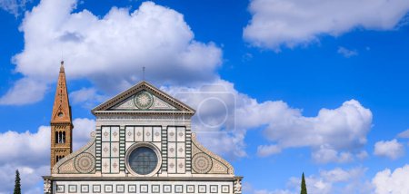 Photo for Basilica of Santa Maria Novella in Florence, Italy: detail of the upper part of the facade with the innovative S-volute features designed by Alberti. - Royalty Free Image