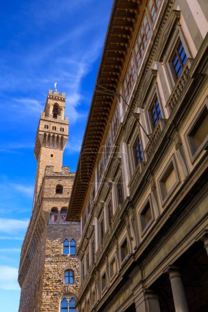 Photo for Urban view of the historic center in Florence, Italy: the Palazzo Vecchio with Arnolfo's Tower from courtyard of the Uffizi Gallery. - Royalty Free Image