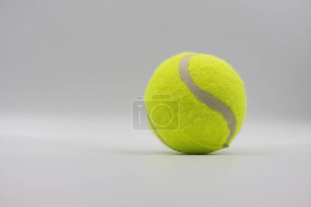Photo for One paddle ball isolated on grey background. Close-up. - Royalty Free Image