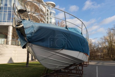 Photo for Preparing boats for winter. Storage of boats and yachts. Boat cover. - Royalty Free Image