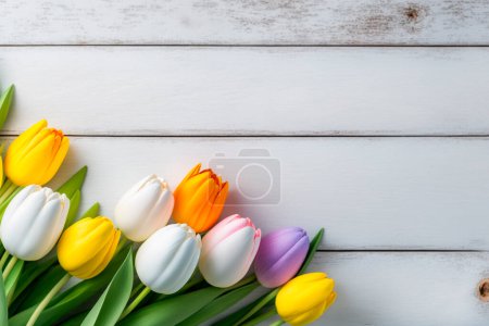 Photo for Multicolored tulips on a white wooden background top view. Mothers day, Valentines Day, Birthday. Generative AI. - Royalty Free Image