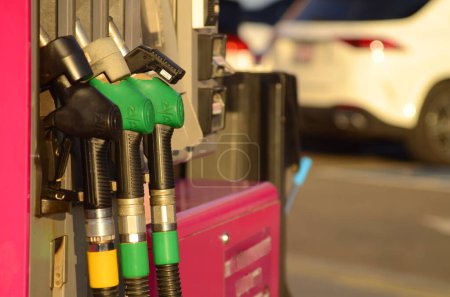 Photo for Refuel fill up with petrol gasoline. Petrol pump filling fuel nozzle in gas station. Petrol industry and service. Petrol price and oil crisis concept. - Royalty Free Image