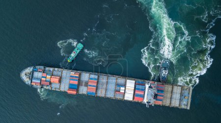 Photo for Aerial view container ship and tugboat drag shipping to seaport, Container ship load container for global business logistics import export, Freight shipping and transportation. - Royalty Free Image