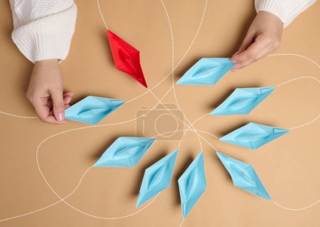 Paper boats with different trajectories