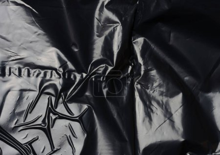 Téléchargez les photos : Texture de cellophane noir froissé, plein cadre - en image libre de droit