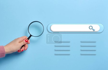 Search bar and a woman's hand with a magnifying glass on a blue background, searching for information on the World Wide Web of the Internet