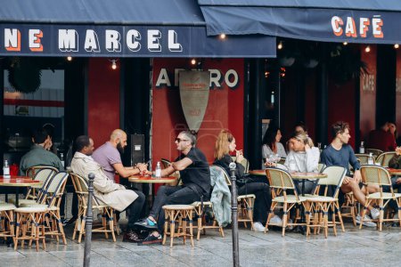 Photo for Paris, France - 26.09.2021 : People at the restaurant in the area of Etienne Marcel, Paris city center - Royalty Free Image