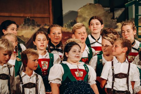 Photo for Fulpmes, Austria - August 15, 2023: Habitants of the Austrian village of Fulpmes celebrate the Assumption Day, making a lovely concert - Royalty Free Image