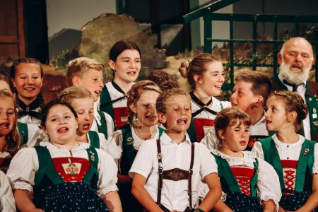 Photo for Fulpmes, Austria - August 15, 2023: Habitants of the Austrian village of Fulpmes celebrate the Assumption Day, making a lovely concert - Royalty Free Image