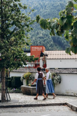 Photo for Fulpmes, Austria - August 15, 2023: Habitants of the Austrian village of Fulpmes celebrate the Assumption Day, wearing traditional clothes - Royalty Free Image