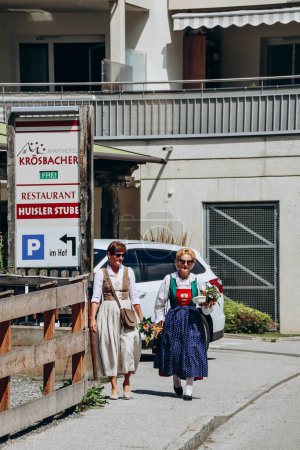 Photo for Fulpmes, Austria - August 15, 2023: Habitants of the Austrian village of Fulpmes celebrate the Assumption Day, wearing traditional clothes - Royalty Free Image