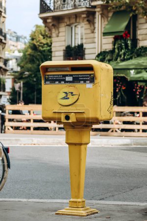 Photo for Paris, France - October 1, 2023: Typical yellow Parisian letter box on the street - Royalty Free Image