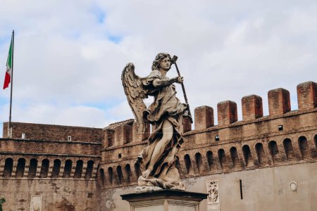 Photo for St. Angelo Bridge and Castel Sant'Angelo in Rome on a cloudy December day - Royalty Free Image