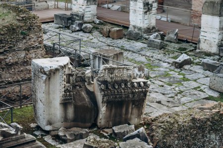 Photo for The Roman Forum, a rectangular forum (plaza) surrounded by the ruins of several important ancient government buildings - Royalty Free Image