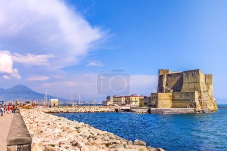 Photo for Naples, Italy - scenic view of Castel dell'Ovo (Egg Castle) and Mount Vesuvius in the background - Royalty Free Image