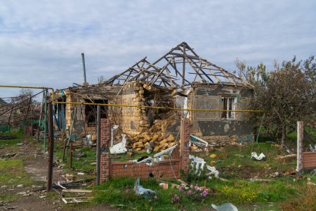 Photo for War in Ukraine. 2022 Russian invasion of Ukraine. Countryside. House destroyed by shelling. Destruction of infrastructure. Terror of the civilian population. War crimes - Royalty Free Image