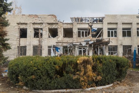 Photo for War in Ukraine. 2022 Russian invasion of Ukraine. Administrative building damaged by shelling. Destruction of infrastructure. Terror of the civilian population. War crimes - Royalty Free Image