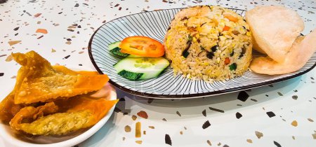 Photo for Flavors of Malaysia: Stir-Fried Rice (Nasi Goreng with keropok a - Royalty Free Image