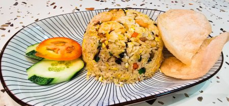 Photo for Flavors of Malaysia: Stir-Fried Rice (Nasi Goreng with keropok a - Royalty Free Image
