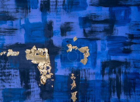 Contemporary artwork in dark blue with gold or yellow accents, rough brushstrokes, hand-painted painting on canvas. Acrylic art, art texture. Abstract grunge background, hand painted, background.