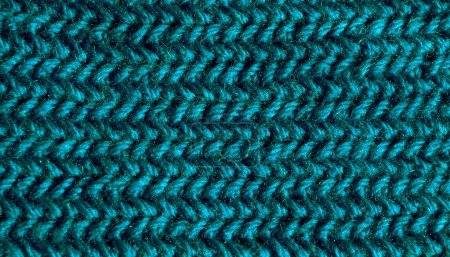 Téléchargez les photos : Texture d'un motif au crochet en fil de laine turquoise. Échantillon en gros plan du modèle. - en image libre de droit