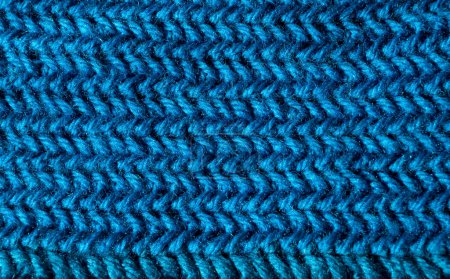 Téléchargez les photos : Texture d'un motif au crochet en fil de laine turquoise. Échantillon en gros plan du modèle. - en image libre de droit