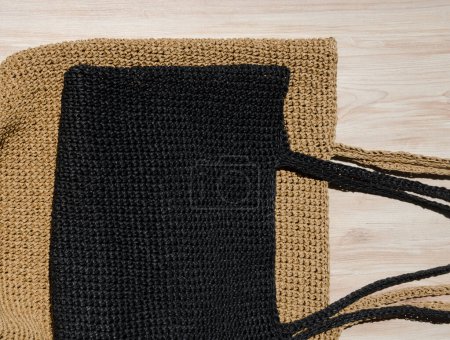 Two women's EKO bags made of raffia black and beige. Crocheted beach bags, handmade.