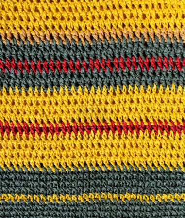 Texture au crochet de Raffia. Sacs au crochet, embrayages, chapeaux, portefeuilles. Matériau écologique pour le travail à la main.