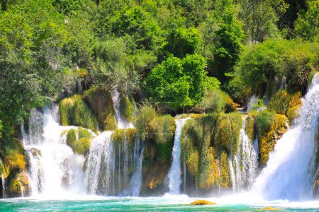 Beautiful waterfall on Plitvice Lakes, Croatia in spring or summer. The best big beautiful Croatian waterfalls, mountains and nature.