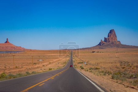 Highway Road U.S. Highway 163 and Monument Valley at sunset, Arizona, United States