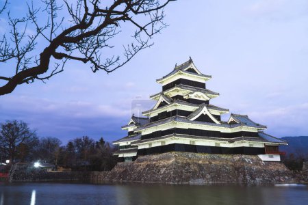 Photo for Matsumoto Castle before sunset with reflection. Historic old castle in Nagano Prefecture, Japan. - Royalty Free Image
