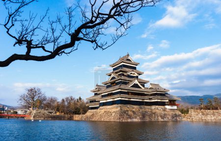 Photo for Matsumoto Castle red bridge with blue sky. Historic old castle in Nagano Prefecture, Japan. - Royalty Free Image