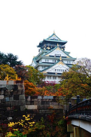 Photo for Osaka Castle in autumn. Public park area has historic old castle in Osaka Prefecture, Kansai, Japan. Background with copy space. - Royalty Free Image