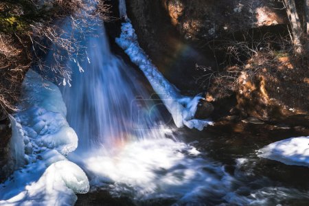 Photo for Ryuzu waterfall during winter with rainbow at Nikko national park, Tochigi, Japan. - Royalty Free Image