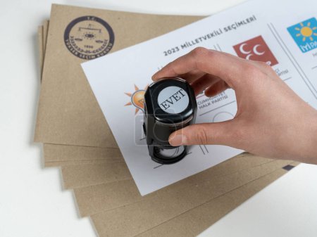 Photo for 14 May 2023 Turkey, 14 May 2023 Turkish member of parliament elections. Ballot and stamp. 14 Mayis Turkiye cumhurbaskanligi secimi. - Royalty Free Image