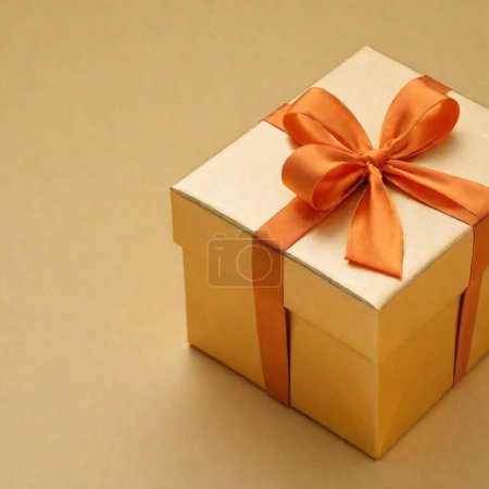 boîte cadeau orange sur fond or uni