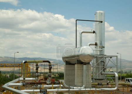 Photo for Geothermal energy hot water extraction pump, industrial plant, oil refinery, pipes and gas pipeline, - Royalty Free Image