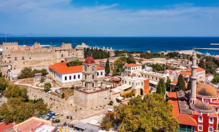 Photo for Panoramic view of Rhodes old town on Rhodes island, Greece. Rhodes old fortress cityscape with sea port at foreground. Travel destinations in Rhodes, Greece. - Royalty Free Image