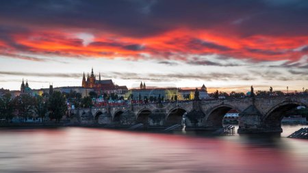 Photo for Charles Bridge in Prague in Czechia. Prague, Czech Republic. Charles Bridge (Karluv Most) and Old Town Tower. Vltava River and Charles Bridge. Concept of world travel, sightseeing and tourism. - Royalty Free Image