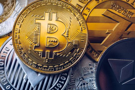 Photo for Set of cryptocurrencies with Bitcoin, Etherium, Ripple, Litecoin. Cryptocurrencys new digital money. Bitcoin on the front as the leader. Bitcoin as most important cryptocurrency. - Royalty Free Image