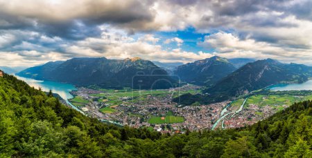 Photo for View from Harder Kulm in Swiss Interlaken in summer sunset. Turquoise Lake Thun and Brienz in background. Stunning scenery on top of Harder Kulm over Interlaken. Berner Oberland, Switzerland - Royalty Free Image