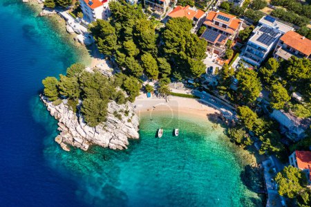 Photo for Amazing aerial view of the beautiful Podrace beach in Brela, Makarska Riviera, Croatia. Aerial view of Podrace beach and waterfront on Makarska riviera, Brela, Dalmatia region of Croatia. - Royalty Free Image